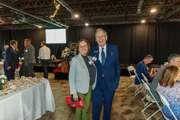 Terry Forcht and Corbin Mayor Suzie Razmus greet each other before the start of the 2024 East Kentucky Leadership Conference’s dinner and awards ceremony held at The Pennington in downtown Corbin.