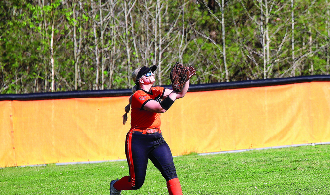 Chelsea Hendrickson makes the play in the outfield. Photo by Larry Spicer.