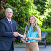 Dr. Larry L. Cockrum, university president, presents the award to Haleigh Hopper.