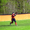 Chelsea Hendrickson makes the play in the outfield. Photo by Larry Spicer.